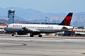 A Delta A320 in the current livery at Las Vegas