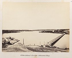 The original Glebe Island Bridge, photographed in 1878–9, looking South West from Pyrmont to Rozelle Bay and Glebe Island (on Right).