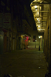 A dark alley in the French Quarter of New Orleans at night, part of the distinctive architecture that made it the centre of Gothic novels by authors including Anne Rice and Poppy Z. Brite Noalleynight.jpg