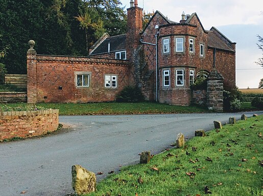 North Lodge - Also designed by George Devey, showing actual colour of brickwork of Adderley Hall. North Lodge Adderley2.jpg
