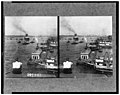 North from roof of pier -52 showing the S.S. Lusitania being "warped" into dock, New York City LCCN93504685.jpg