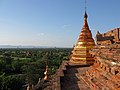 Thumbnail for File:Old Bagan, Myanmar, Golden Buddhist spire over Bagan plains, Ancient pagodas.jpg