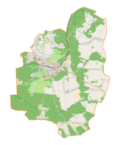 Mapa konturowa gminy Olkusz, blisko centrum u góry znajduje się ikonka zamku z wieżą z opisem „Zamek w Rabsztynie”