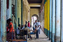 Elderly Cubans playing dominoes Playing Domino's (16643582962).jpg