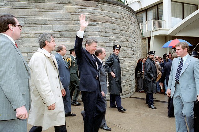 640px-President_Ronald_Reagan_moments_before_he_was_shot_in_an_assassination_attempt_1981.jpg