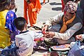 Priest_sacred_bracelet_boy_Shrawan_Monday