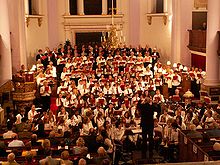 Members of Queen Elizabeth's High School and Gainsborough Choral Society perform in an annual Christmas carol concert, "Carols for All." Phillip Ainsworth (previous Head of Music) conducts. Qehscfa.jpg