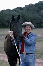 Ronald Reagan wearing stonewash denim associated with Western clothing, 1970s Reagan with horse.jpg