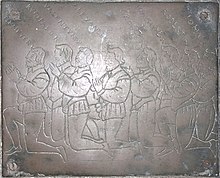 The eight sons of John Rolle by his wife Margaret Ford. Their names are inscribed left to right: Henrye R, Rychard R, Valentyne R, Alexander R, George R, Joachyme R, Robert R, John R. Monumental brass panel to right of brass of their mother Margaret Ford, floor of south aisle, St Giles in the Wood Church RolleSonsStGilesInTheWoodDevon.JPG