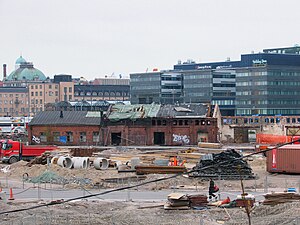 Ruines de l'entrepôt en 2007. Au premier plan travaux de fondation de la Maison de la musique d'Helsinki.