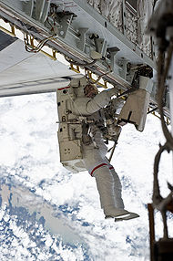 Astronaut Rick Mastracchio working with a SAFER system attached. STS-131 EVA3 Rick Mastracchio 2.jpg