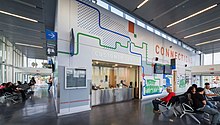 Interior of San Bernardino Transit Center station building with customer service office and waiting room