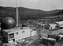 The Saxon nuclear power plant under construction in 1961. The hemispherical-topped structure to the left housed the nuclear reactor. Saxon NPP 1961.jpg