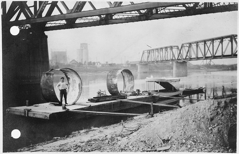 File:Steel rings and I-beam removed from tubes - NARA - 285922.jpg