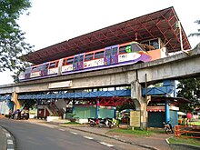 Air-powered Aeromovel people mover ride around the TMII theme park TMII Aeromovel train.JPG