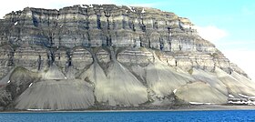 Talus cones on north shore of Isfjord, Svalbard, Norway, showing angle of repose for coarse sediment TalusConesIsfjorden.jpg