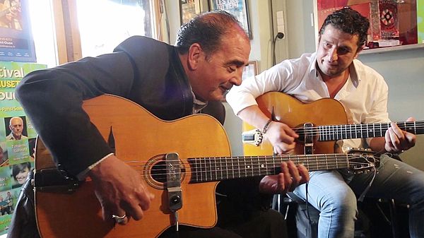 Tchavolo Schmitt (left) with Steeve Laffont, playing their brand of gypsy jazz at la Chope des Puces, Paris, in 2016