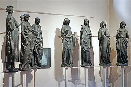 Original statues of the Tempter, the foolish Virgins and the wise Virgins from the right façade portal