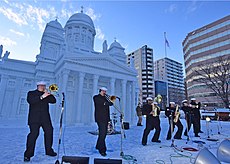 The U.S. 7th Fleet Band performs at the 70th annual Sapporo Snow Festival (46147976845)..jpg
