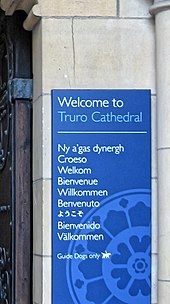 Welcome sign at Truro Cathedral in several languages, including Cornish