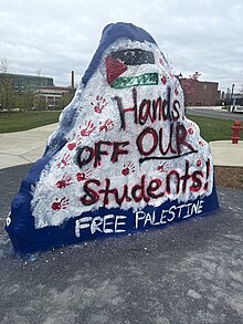 A rock at the University of Connecticut, painted in response to the arrest of protesters on April 30 UConn pro-Palestinian paint rock 2.jpg