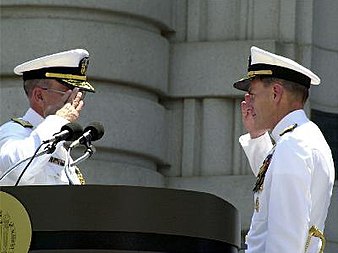 Admiral Jay L. Johnson and Admiral Vern Clark of the United States Navy salute each other during a change-of-command ceremony. Clark is relieving Johnson as Chief of Naval Operations. USNsalute.jpg