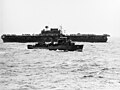 USS Fanning (DD-385) maneuvers in front of USS Enterprise (CV-6), 18 April 1942