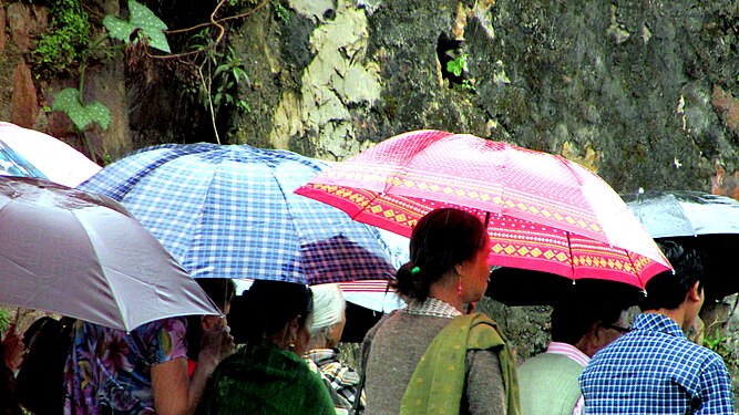 A religious procession on a rainy day