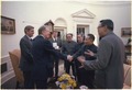 Walter Mondale, Jimmy Carter and Zbigniew Brzezinski meet in the Oval Office with Deng Xiaoping and other Chinese... - NARA - 183220.tif