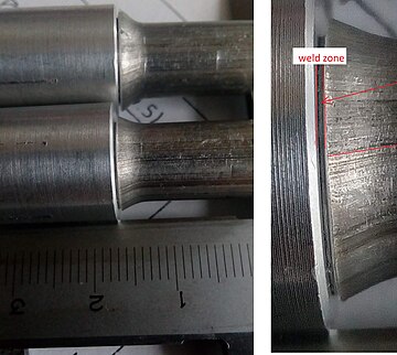 Rotary Friction welding weld photo. Weld without clearly formed flash. No flash but something like the upset is visible on the right component (torsion line is not visible). The scale of the calliper is in mm. However, there's the problem:In this case, the very short friction time was used so real-time and direct temperature measurement of the weld center can be problematic, moreover welding in a short time causes risks of imperfections such as weld discontinuities. Weld photo.jpg