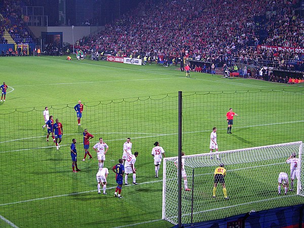 Barcelona's players prepare to attack a corner in the second leg of their third qualifying round tie against Wisła Kraków.