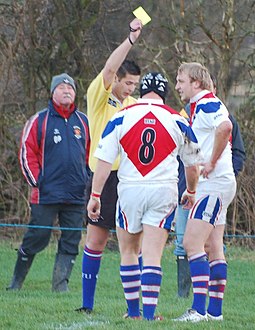 A yellow card indicates the player has committed a cautionable offence and must spend ten minutes out of the game. The player can not be replaced during this time. Yellow Card.jpg