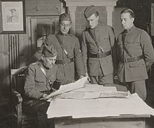 General Robert Alexander studying reconnaissance data with his aides near Varennes-en-Argonne in October 1918. 111-SC-42747 - NARA - 55244695-cropped.jpg