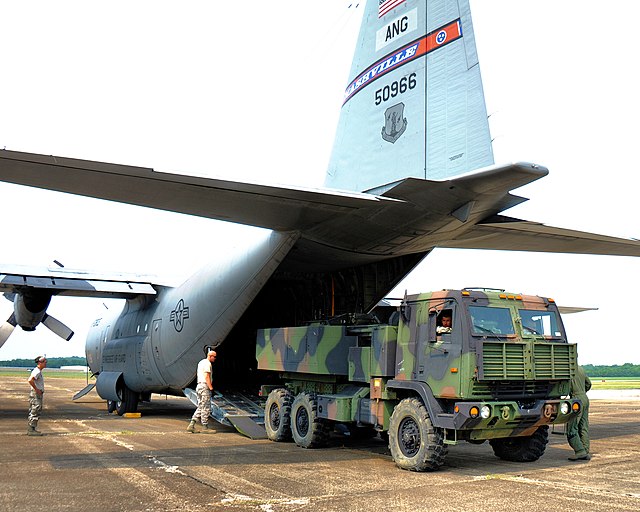 A HIMARS launcher being loaded into a C-130 Hercules aircraft in 2011