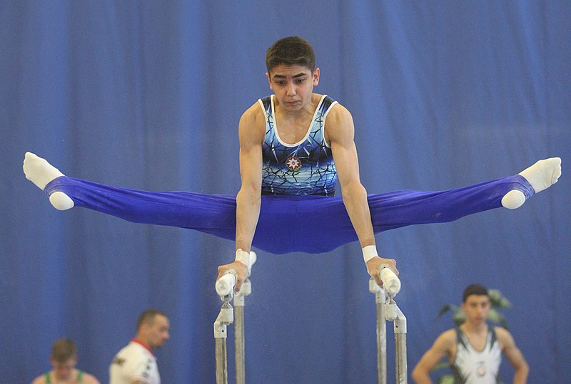 File:2019-05-25 Budapest Cup age group II all-around competition parallel bars (Martin Rulsch) 055.jpg