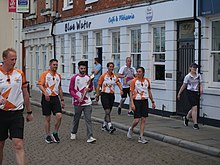 The baton being carried through Kingston upon Hull on 13 July 2022 Commonwealth Games Hull Baton Relay 2.jpg