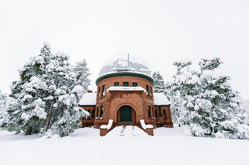 File:A snowy building in trees (Unsplash).jpg