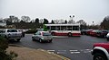English: Abellio Surrey 8099 (YT51 EAP), a Dennis Dart SLF/Plaxton Pointer MPD, at Woking Morrisons supermarket, Woking, Surrey, on either routes 426 or 446. It is seen on the bus turning circle, which, due it it being Christmas Eve and thus very busy, has ignorantly parked cars all around it, which meant the bus had to stop and reverse to get out - quite chaotic when there is a line of cars trying to get past in either direction. Luckily, being a short bus is didn't take too one and it was free with one reversing manouvure.