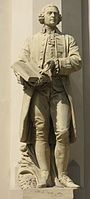 El filósofo Adam Smith, escultura de 1862 en la Handelsakademie de Viena