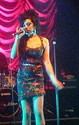 Amy Winehouse performing at KOKO in London, November 14, 2006 (cropped).