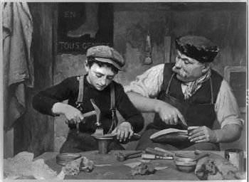 English: Apprentice. Man and boy making shoes.
