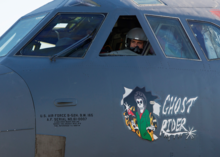 Lt. Col. Jeremy Holmes, 69th BS commander, peers out of a window of the B-52H Stratofortress 61-007 'Ghost Rider' at Minot AFB, 27 Sep 2016 B-52H 61-007 Ghost Rider.png