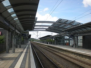 Double-tracked railway line with side platforms