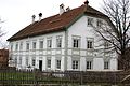 Ehemaliges Gerichtsschreiberhaus, später Forstamtsgebäude, in der Bahnhofstraße 26 in Benediktbeuern, Landkreis Bad Tölz-Wolfratshausen, Regierungsbezirk Oberbayern, Bayern. Als Baudenkmal unter Aktennummer D-1-73-113-6 in der Bayerischen Denkmalliste aufgeführt.