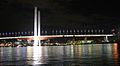The Bolte Bridge at night, with Etihad Stadium, and Melbourne CBD in the background
