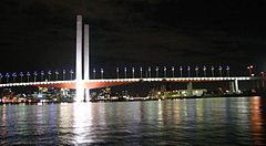 The Bolte Bridge at night, with Etihad Stadium, and Melbourne CBD in the background