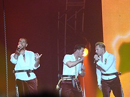 Lynch (left) performing with Boyzone in 2009