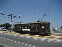 Streetcar on Canal Street, April 2007 CanalCemsKeepItCleanTram.jpg