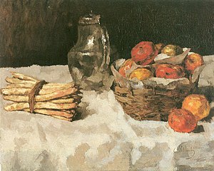 Apples on white: with baskets, pewter and bunch of asparagus