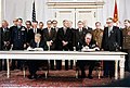 with Soviet General Secretary Leonid Brezhnev sign the Strategic Arms Limitation Talks (SALT II) treaty, June 18, 1979, in Vienna